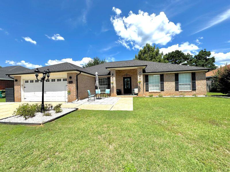 This dwelling has a community pool & tennis/pickleball courts that YOU don't have to maintain. This home has a split bedroom plan, with a flex room, & a delightful screened-in back porch which has access from three separate rooms. Flex room complete w/French doors to make it that room you've always wanted! Improvements include freshly painted common areas, new kitchen appliances, remodeled bathrooms, widened driveway, firepit, privacy fence, & level pristine yards. Enjoy reduced county taxes due to location outside city limits. Schools, Publix, P.O., library, City Community Center, & Pounders, all within 1.5 miles! With amazing, helpful & friendly neighbors, how could you go wrong? This home is the one for you! Call to get your private showing of the best-looking house on the street.