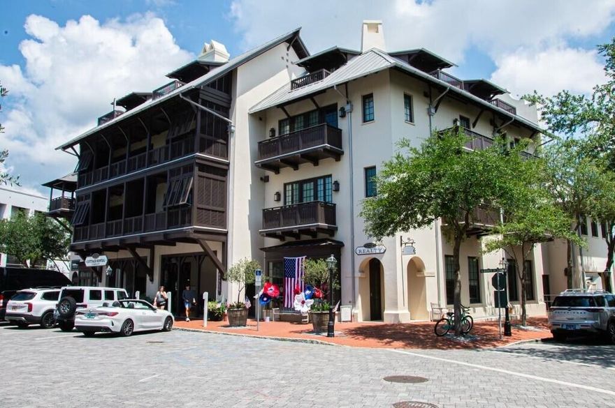Top of the Town, luxury condo overlooking Barrett Square, in the heart of Rosemary Beach, with glimpses of the gulf from your 3 private balconies, and the best seat in town for the many seasonal events emanating from Barrett Square.  This immaculate and functional condo has over $105K actual rental income on the books YTD.  Offered fully furnished, rental ready, this condo features 2 bedrooms and 2 full baths and sleeps six.  You'll love the white Carrara marble countertops, Viking and Sub Zero appliances, and beautiful tile work in the kitchen and bathrooms.  New AC, July 2024, new roof, new bathroom vanity, new washer and dryer, and the elevator service in Barrett Place is from the underground parking garage or ground level lobby.  You will treasure the deeded personal storage unit in