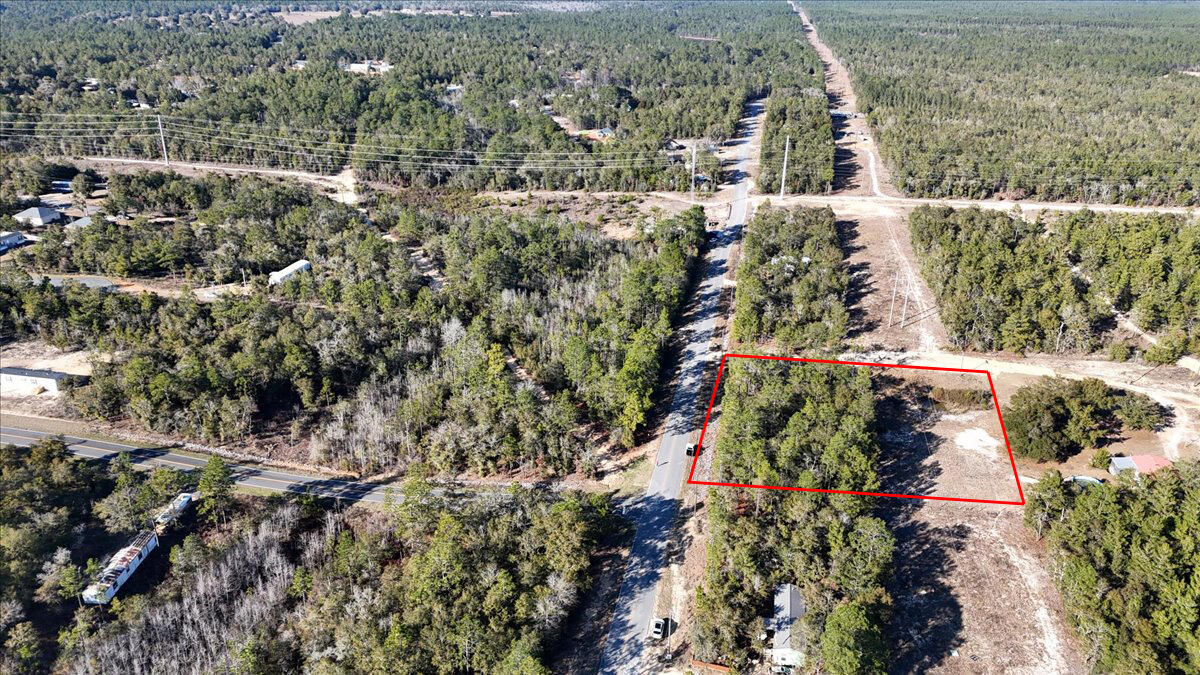 Excellent buildable lot in a growing neighborhood. Paved road! Mobile homes allowed. No flood insurance required. Power is available in the area, as well as water, septic likely needed. Enjoy convenient access to I-10 and CR 285, putting you just a short commute from most workplaces and the stunning white sandy beaches of Florida's Emerald Coast.