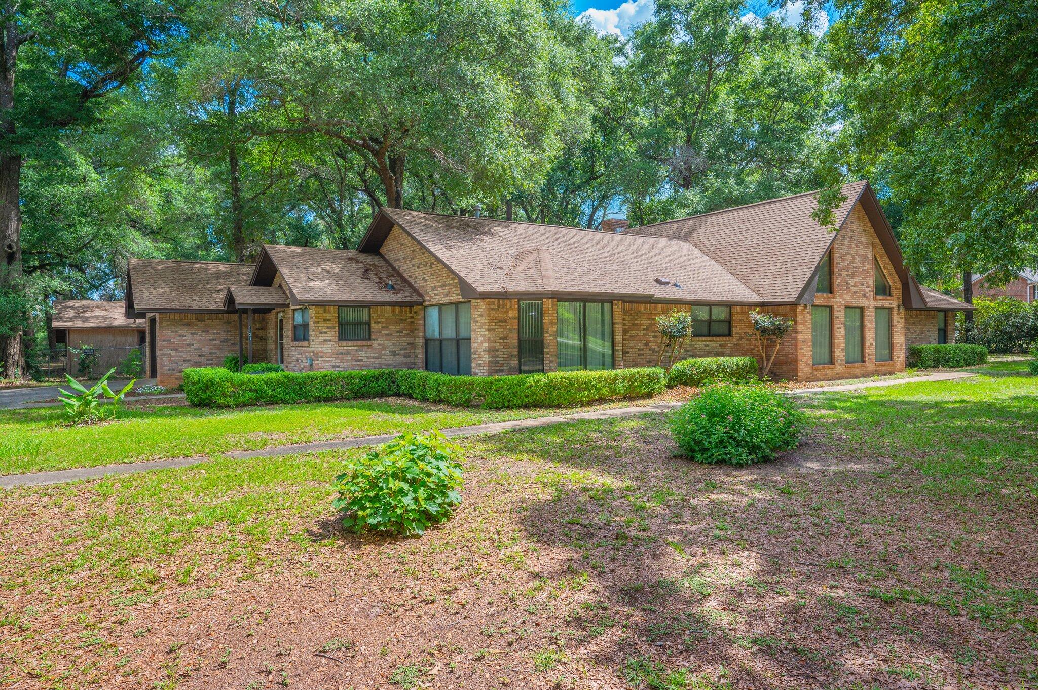 Welcome to your peaceful country escape--without sacrificing convenience! This spacious 3-bedroom, 3-full-bath home sits on 2 beautifully wooded acres, offering privacy, tranquility, and quick access to local military bases, beaches, and shopping centers.Inside, you'll love the expansive vaulted living room filled with natural light pouring in through large pane windows. A true wood-burning stove adds rustic charm and warmth, making it the perfect place to relax on chilly winter evenings.The home features a versatile layout and is ready for your personal touch. Outside, you'll find a powered 12x25 workshop ideal for hobbies or storage, along with a large lean-to--perfect for tractors, equipment, or outdoor gear.Additional features include:Roof replaced in 2022HVAC 2016 Brand new gas water heater being installed by seller
Whether you're looking for a forever home or a countryside getaway, this property offers endless potential. Bring your vision and make this inviting country home your own!