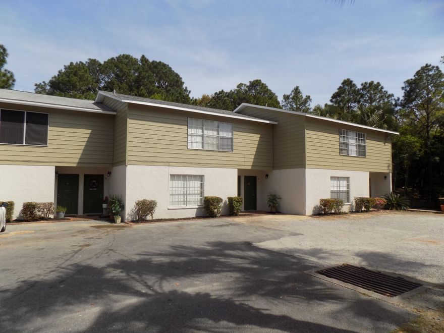 INVESTOR SPECIAL!! SIX unit apartment complex with water views in the heart of Ft. Walton Beach. 3 downstairs and 3 upstairs units. All large 1 bedroom 1 bath units with family room, dining room and kitchens. Downstairs units have patios that also have storage closets. Upstairs units are slightly larger than downstairs units. Quite location. Units stayed rented . Waterview's with access to Gardner's Bayou through a canal- Owners have completely update the outside of the complex putting in over $75K in improvements. Most units have been updated over last several years as tenants move out. Don't miss out on the great investment opportunity.