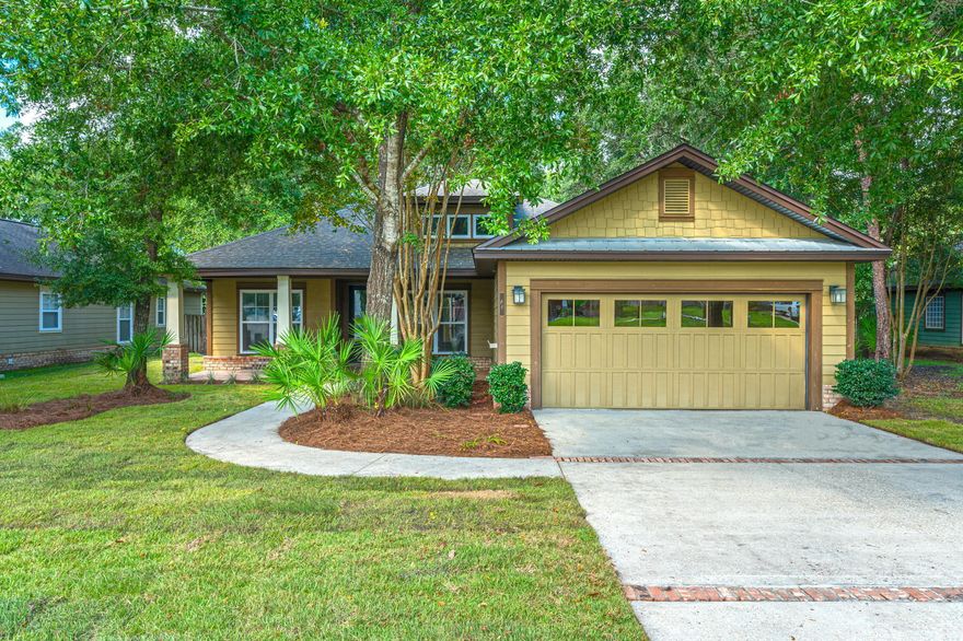 This wonderful 3 bedroom and 2 bathroom home, with a 2 car garage, is located in the Canopies of Freeport. An ideal floor plan provides a relaxed flow throughout the residence, while large windows and doors provide an abundance of natural light. A spacious main living area opens to a generous dining area, and a well-appointed kitchen. The roomy master suite features a large bathroom; with split vanities, a walk-in shower, and separate alcove tub, along with a large walk-in closet.  Two additional bedrooms and a bathroom round out the homes interior.  A large screened provides provides ample additional outdoor living space while looking out over the private backyard.  The Canopies of Freeport also has a neighborhood pool.