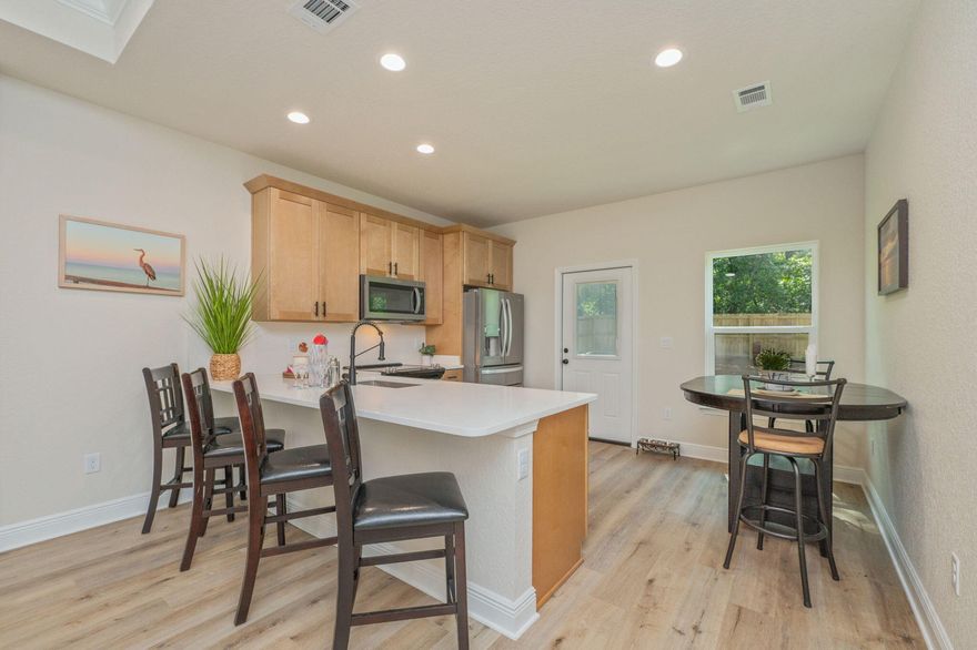 Seller is offering up to $10000 in closing cost assistance!! All new appliances convey, and privacy fence and irrigation system is already a part of this beautiful quality-built homes package!Homeowners insurance quoted at as low as $538 per year which makes home ownership more than a dream, we make it a reality!The bathrooms are well designed with tile in the wet areas, all LVP flooring, no carpet. The ceiling trays up with the added drama of crown molding and recessed lights throughout. This home is located less than 3 miles from downtown Crestview, less than 3 miles from the municipal park Twin Hills, within 5 miles of multiple shopping centers, less than 8 from duke field, 22 from Eglin AFB. We know you will love it! Home to be completed fully early part of January. These are pictures of a similar build professional pictures of actual build coming soon. Be the first to see it! 