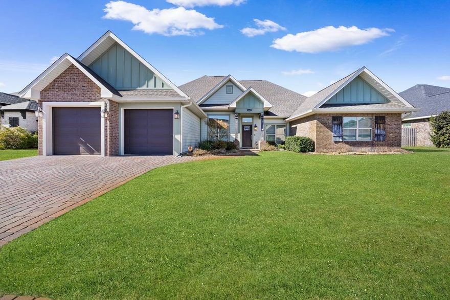 Florida living at its best. Beautiful custom pool home located in the highly desirable gated community of Soundside Shores. This meticulously maintained pet free home is move-in ready. This split floor plan home offers 4 bedrooms, 3 full bathrooms, a private office, formal dining room, breakfast nook, and a living room highlighted by stunning vaulted beamed ceilings. The open gourmet kitchen is a chef's dream featuring a convention oven and microwave, abundant cabinetry, generous storage, breakfast bar, and a walk-pantry - perfect for everyday living. The primary suite showcases a trey ceiling with crown molding and a luxurious spa-style bathroom complete with a walk-in shower, soaking tub, dual granite vanities, private water closet, and large walk-in closet attached to the laundry room. Second and third bedrooms share a Jack & Jill bathroom. The private fourth bedroom has a bathroom close by which would make the perfect guest area. Plantation shutters throughout the home add a refined finishing touch. Step outside to a true backyard oasis featuring a gunite pool with reverse osmosis water, a huge covered patio, and a large gazebo with outdoor gas and water hookups-ideal for entertaining. The fully fenced backyard is beautifully landscaped. Additional highlights include a Generac generator and a security system. The Sound and Public boat ramp are a short walk away as well as the Nature Reserve Park. An exceptional home offering luxury and comfort.