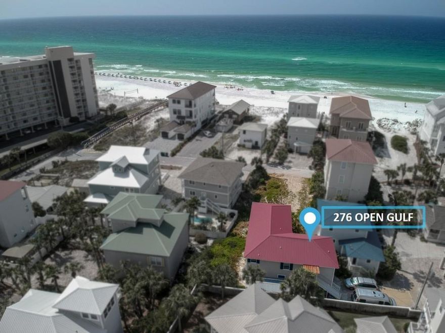 10-second walk from the front door to the beach. 3 block nature walk to everything in town. located AT dead end ,private quiet secluded away from the hustle and bustle. Both  floors are fully self-contained units including  laundry. Lock out live in one rent the other. 5 to 6 car parking .coveted Destin beachfront area. 60 to 80 K annual rent.You're every necessity(including huge silver sands outlet mall) within 3 block nature walk to town. Uncrowded beaches. NO HOA. Top-of-the-line new stainless (Whirlpool Samsung) appliances.New granite countertops new flooring new paint, carpet throughout. Two huge party decks one for each floor With French doors to each(3 sets furniture on each). Gulf views ,private garage ,8 by 20 storage.
