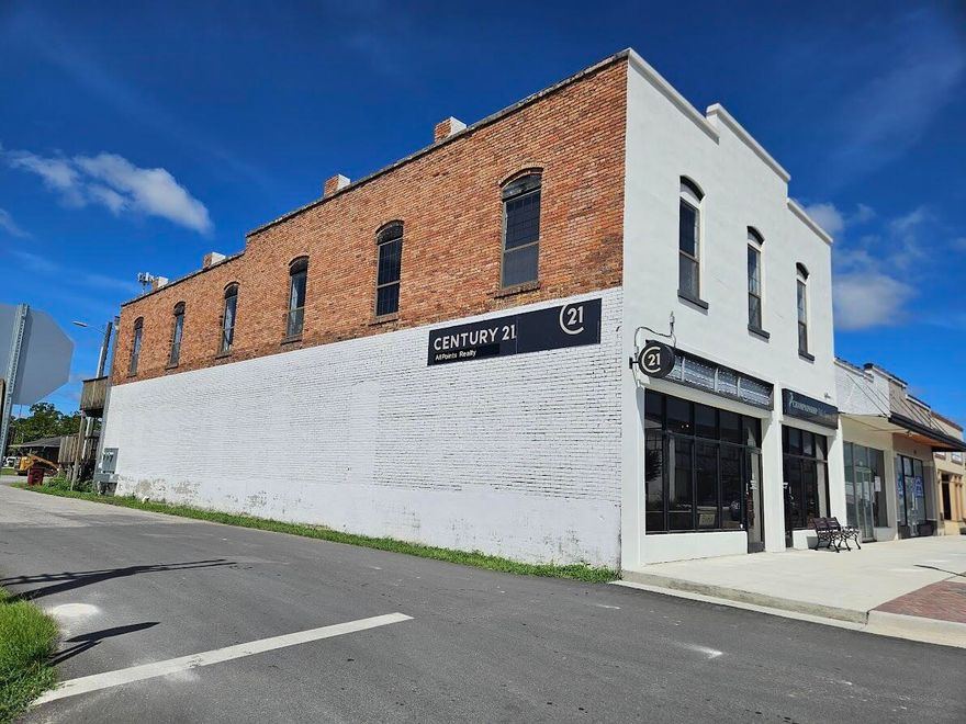 Iconic two-story office building nestled in the heart of Crestview's revitalized Main Street district. The main building on two floors boasts 12 private offices, a welcoming reception area, two break rooms, and two bathrooms, all showcasing original brick and pine finishes. A separate ground floor office space, accessible from Main Street, offers additional flexibility with two private offices, a conference room, break room, and bathroom.This central location provides unparalleled convenience, with easy access to Eglin Air Base and nearby industrial corridors along I-10 and Hwy 90.  All information is deemed to be accurate but to be verified by recipients and suitability for intended use.