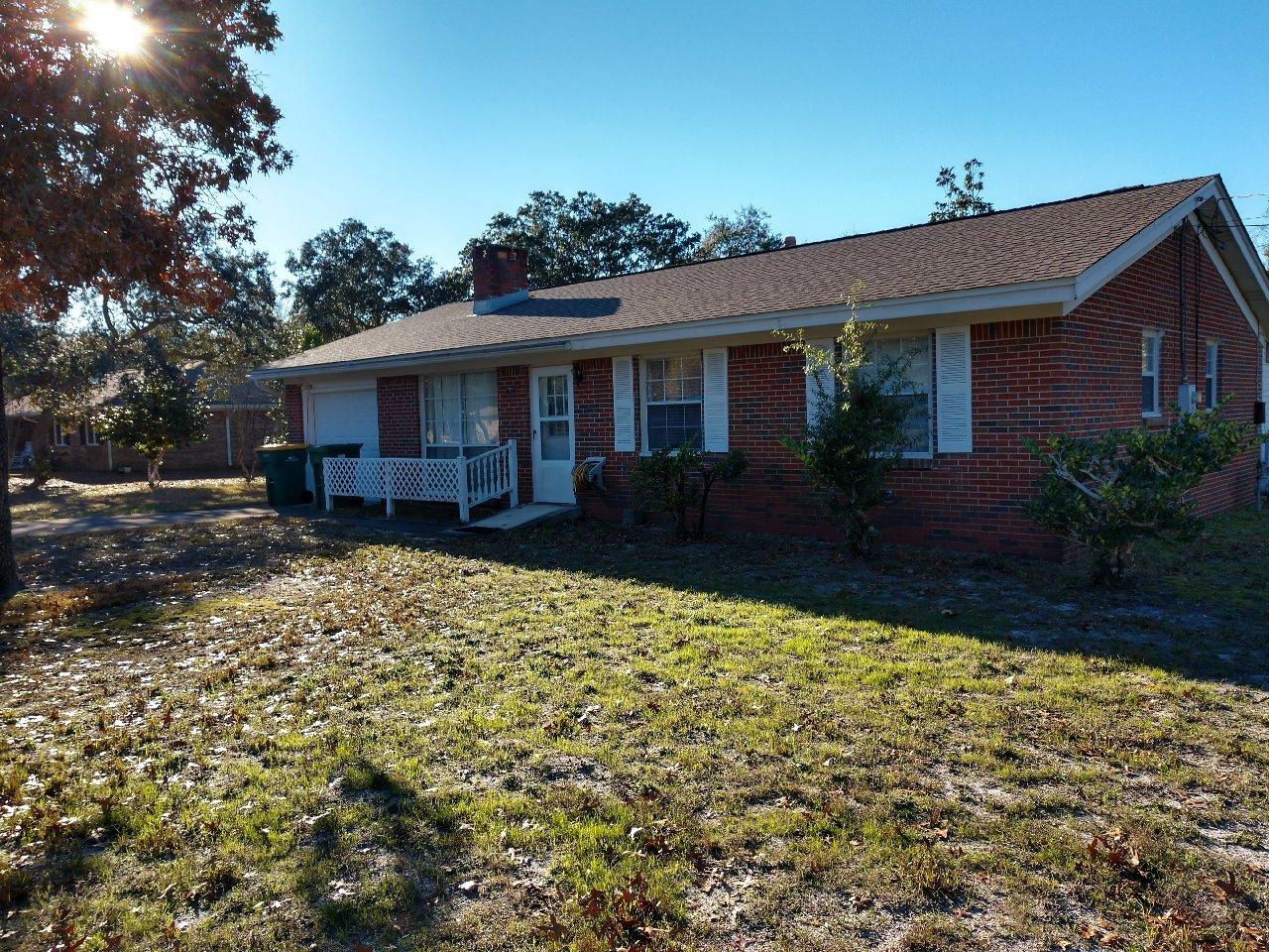 Smaller home on LARGE lot in great subdivision! Easy to see. Home has 2 bedrooms and a 3rd smaller room that could be an office or childs room, 2 baths, formal living room, formal dining room and kitchen with breakfast room area. There is an enclosed porch area and a room with an exercise pool off the master bedroom. Home is all electric except for gas heat. Roof replaced 4 yrs ago, Pergo type flooring in LR, DR and hall done 4 yrs ago. The sellers have not lived in the home, this is an estate sale and is being sold AS IS ONLY. Pool and appliances not warranted by seller, buy has right to inspections. Front half of garage is storage and back half of garage has been converted into 3rd room. Yard has chain link fencing.
