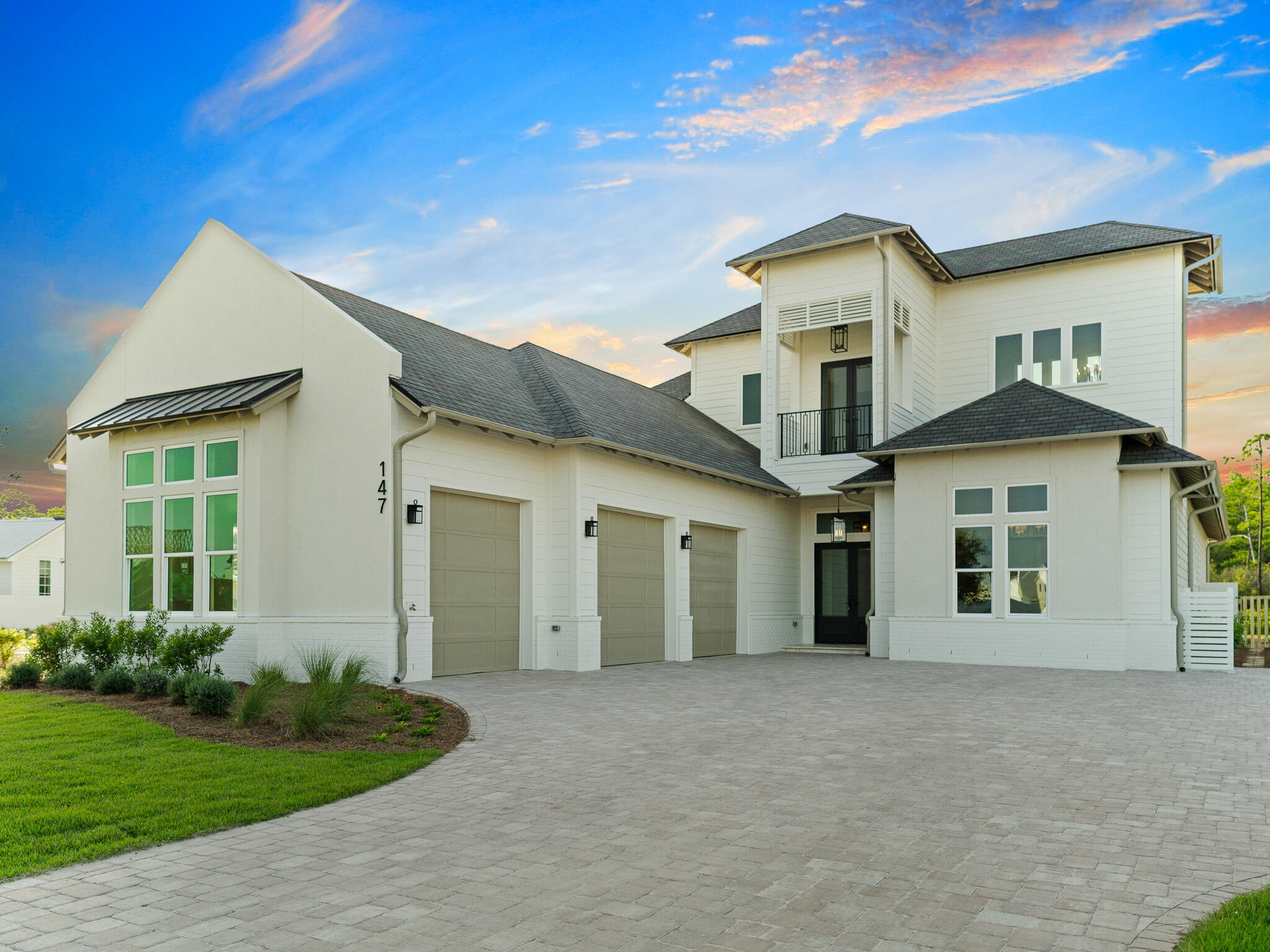 Designed by renowned architect John Williams, this elegant new construction nestled behind the private gates of Camp Creek features impressive craftsmanship with a tasteful coastal flair throughout. A chef's dream, the kitchen encompasses custom milled cabinetry, an oversized island, quartz countertops, and a luxury appliance package with gas range. The expansive living and dining areas are perfectly positioned off the kitchen with direct access to the covered porch with outdoor kitchen effectively blurring the lines between indoors and out while creating a true continuation of living and entertaining space. Strategically positioned, the first level main suite facing the pool is paired with a spa-like ensuite featuring dual vanities and custom tiled wet room. Two additional bedroom suites, each with a dedicated ensuite, complete the first floor. Perched atop the second floor, the breathtaking second-floor main suite is a true oasis featuring a private porch providing the perfect place to enjoy the mesmerizing hues and colors provided by the famed Emerald Coast sunsets each and every night along with a sumptuous ensuite.
147 Quail Hallow comes paired with a WaterSound Clubs Membership providing entry to the acclaimed private beach club along with access to some of the area's best golf courses including Camp Creek, Sharks Tooth, Origins, and the planned Davis Love course. The rental restricted community also enjoys exclusive access to the newly constructed amenity center featuring dual pools, lazy river, pickle ball courts, tennis courts, a wellness center, and an on-site restaurant.
Geographically poised between Scenic Highway 30A and Highway 98, the WaterSound Camp Creek community offers convenient access to the iconic town centers of Alys and Rosemary Beach along with the culmination of world-class dining and entertainment options 30A has to offer.
Located directly across Highway 98, the WaterSound Town Center hosts events like a weekly Farmer's Market and encompasses a Publix, restaurants, a STEAM school learning campus, and medical offices. Inquire today to learn more and discover why WaterSound Camp Creek remains one of the most sought after ownership opportunities along 30A for full-time and second home residents alike.
