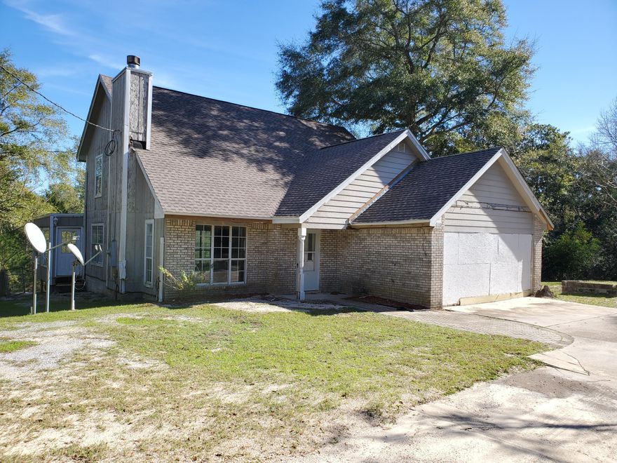 CALLING ALL INVESTORS! Charming fixer-upper located on 5 acres in Crestview! This property is nestled down a long private driveway and overlooks a pond! There is so much potential in this huge 3 bedroom, 2 bath, two story home. This property is distressed and needs updates and TLC, but with a little bit of work it would make the perfect family home! Vacant and easy to show.