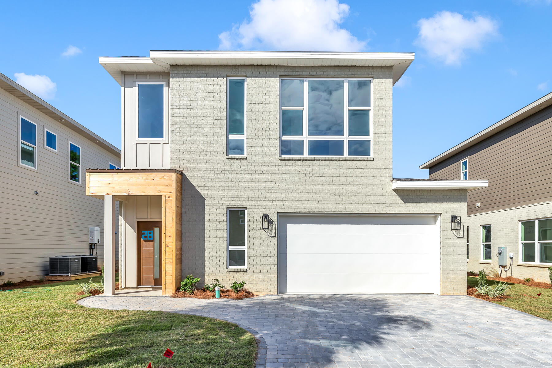 New Construction, move in ready! This new development is located in the highly sought-after North Santa Rosa Beach area and is ready for you to make it your own. With 3 bedrooms and 2.5 bathrooms, this spacious home boasts 1952 square feet of interior living space + a double car garage. As soon as you step inside, you'll be greeted by the open concept layout on the 1st floor. The spacious chef's kitchen features stainless steel appliances, custom cabinetry & white quartz countertops. The kitchen opens up to the expansive living area, making it the perfect space for entertaining guests or family. Upstairs, you'll find the living corridors complete with the Master suite, 2 secondary bedrooms with shared bathroom and the laundry room. Schedule your showing today!