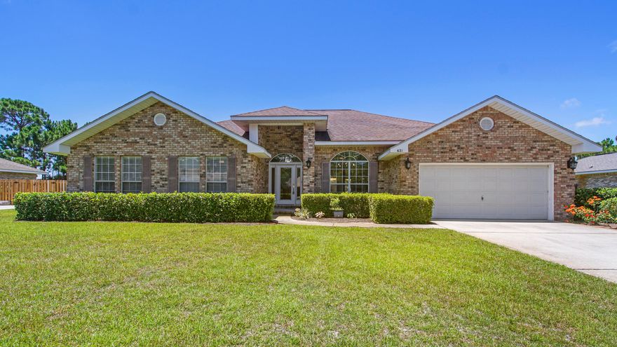 This sprawling, open floor plan, single story brick home is a must see. 4 bedrooms, 3 baths almost 3000 sq ft of living space, sitting on over a half acre lot, backs up to a lake & park. New roof, water heater, appliances, washer/dryer, vinyl plank flooring through out,  tubs, toilets, countertops, backsplash, lighting, custom closets. Painted and power washed,  move in ready. Inside you will find a very large kitchen with 2 islands, gives additional counter seating, ample cabinets and a walk-in pantry, and a large living room with high ceilings. Natural light pours in through the home's large windows and a two-car garage plus ample driveway space. Close proximity to Choctawhatchee Bay, Publix, Sacred Heart Hospital, shops & restaurants at Grande Blvd.