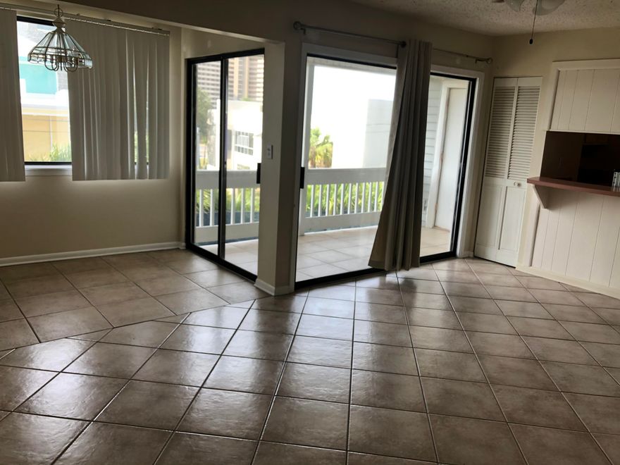 Perfect Location. Great rental. Short term & long term rentals. Tile throughout, Washer dryer hook up. Some expansion over the porch creating more square footage in the unit. Outdoor porch with some view of the Gulf. Nice location in the Community. 3 Pools, Tennis, Lake,Bike racks, Community Room, Close to Beaches, Entertainment & shopping. Buyer to verify any and all dimensions.