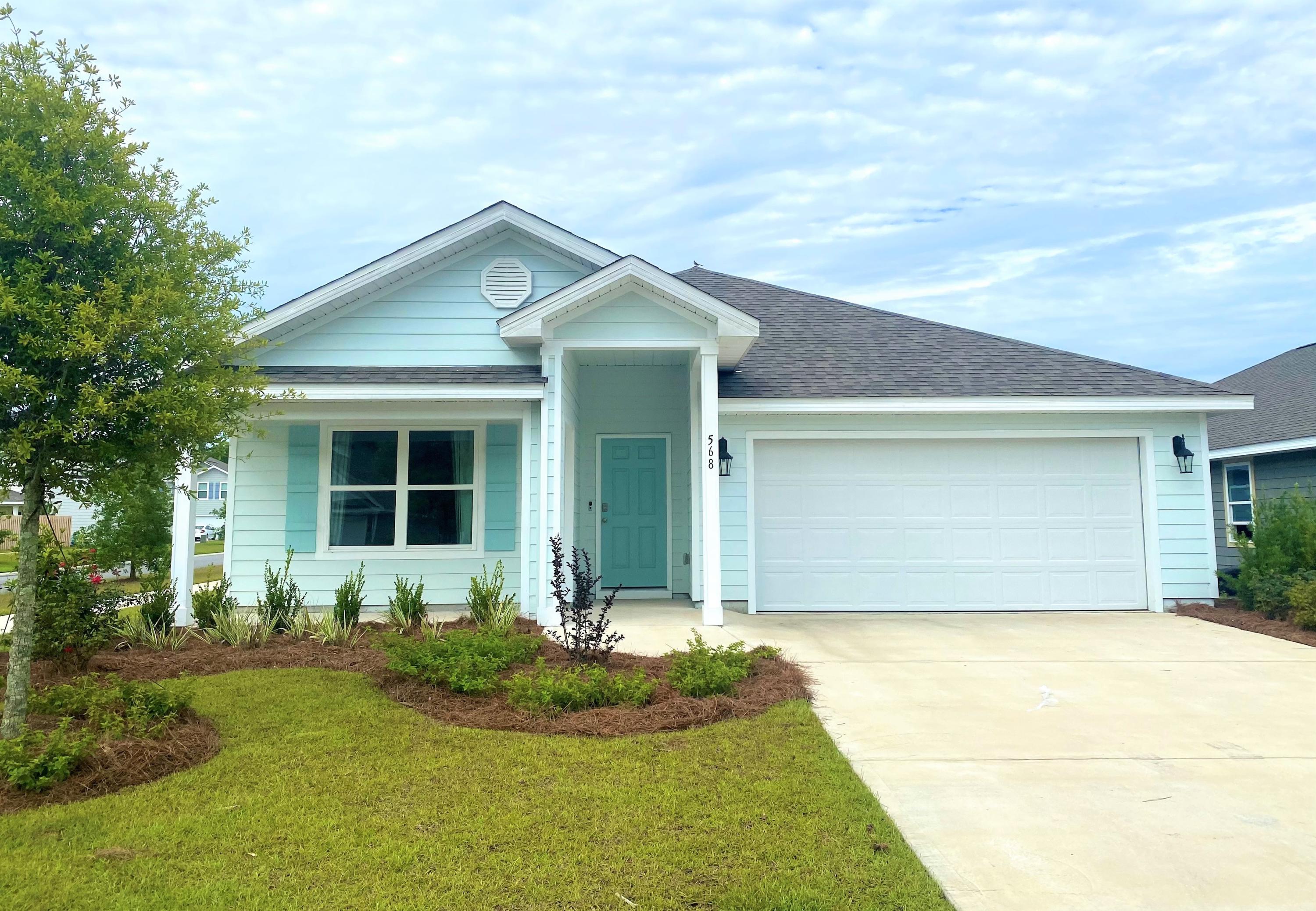 Welcome to Mill Cottages located in the Hammock Bay community! The Cali floor plan is a 4-bedroom, 2 bath, and 2 car garage home. As you enter this home, you will notice the beautiful shaker style cabinetry, and laminate countertops in the kitchen and bathrooms. Vinyl flooring is throughout the common areas of the home, and plush carpet is in all bedrooms. The home also features Whirlpool stainless steel appliances which include an electric range, microwave and dishwasher. Hammock Bay is located on the Choctawhatchee Bay, and a short drive to the white-sand beaches and emerald waters of the Gulf of Mexico along Scenic Highway 30-A.