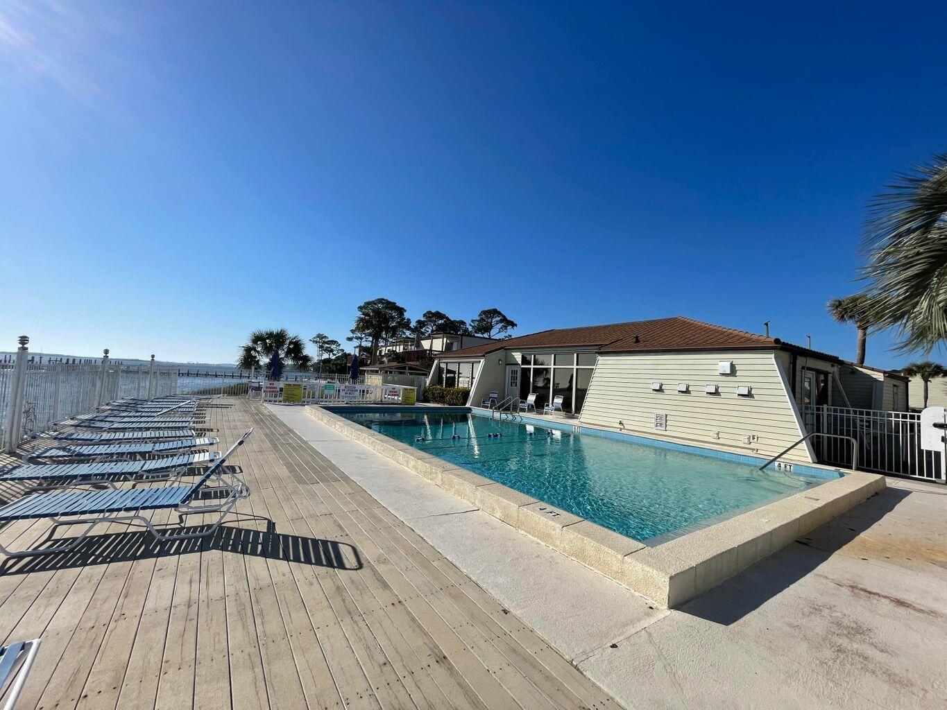 Sunsets await you at this beautiful waterfront complex! This completely renovated 1 bedroom 1 bath condo located in the Fountainhead complex has water views from both sides of this unit located in building 11 on the second floor. The unit has been renovated with all new LVP flooring throughout, a new kitchen with white shaker cabinets, stainless steel appliances and an open concept with a large breakfast bar. A complete rewire was also completed. The complex has a beautiful clubhouse, pool, dock, and private beach all with fabulous views of the Intercostal Waterway. Fountainhead is just 2 miles from the beaches on Okaloosa Island and within close distance to the downtown area of Ft. Walton Bch. No short term rentals allowed, must be at least 30 days. Boat slips are 1st come basis.