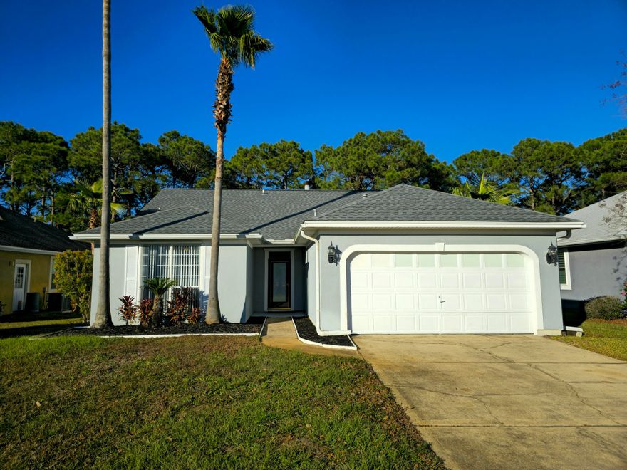 Discover coastal living at its finest with this 3-bedroom, 2-bathroom home in Miramar Beach, just minutes from Highway 98, Silver Sands Premium Outlets, and the white-sand beaches of the Gulf Coast. This home features a spacious living room with a cozy fireplace, a kitchen with ample cabinet space and a breakfast bar, and a private primary suite with dual vanity. Enjoy a fully fenced backyard with an open patio and screened porch. Community amenities include a resort-style pool, tennis courts, a dock, and a park. With its prime location close to shopping, dining, and beach access, this home is perfect for enjoying the Florida lifestyle. Schedule your showing today!