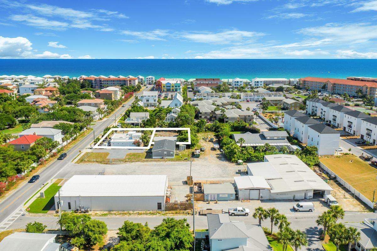 Exceptional development opportunity ideally located south of US Hwy 98 in Miramar Beach, just one block from the beaches of South Walton. This prominently positioned assemblage includes two parcels consisting of one residential dwelling, totalling approximately .37 acres together. 336 Holiday Road South is a three bedroom home situated on a .22 acre lot currently zoned village mixed use and 344 Holiday Road South is a .15 acre lot. Three additional parcels can be purchased (separate of this sale) in addition to these two offerings, totaling just over 2.2 acres; includes two commercial dwellings and 130+ frontage on South Holiday Road. Exceptional development opportunity ideally located south of US Hwy 98 in Miramar Beach, just one block from the beaches of South Walton. This prominently positioned assemblage includes two parcels consisting of one residential dwelling, totalling approximately .37 acres together. 336 Holiday Road South is a three bedroom home situated on a .22 acre lot currently zoned village mixed use and 344 Holiday Road South is a .15 acre lot. Three additional parcels can be purchased (separate of this sale) in addition to these two offerings, totalling just over 2.2 acres; includes two commercial dwellings and 130+ frontage on South Holiday Road. Please reference MLS # 875801 and MLS #.
South Holiday Road is a prominent connector between US Hwy 98 south to Scenic Highway 98 with through traffic from locals and visitors traveling to and from not only the beach, but numerous other businesses nearby including beach shops, restaurants, CVS pharmacy, etc. This assemblage is truly a unique offering and would be an exceptional place for a multitude of development opportunities including single family housing and/or business space.