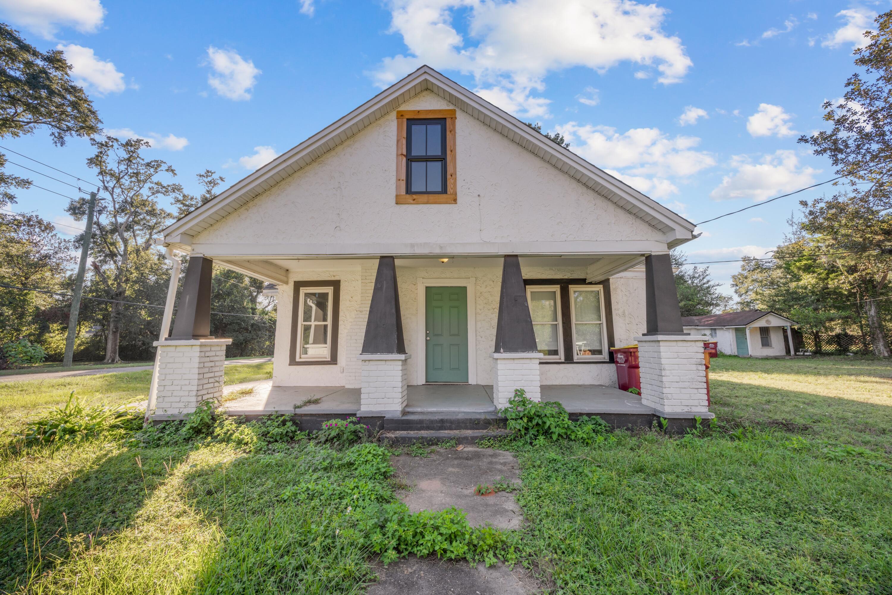 ***Triplex opportunity*** Looking for a unique investment opportunity or multi-generational setup? This Crestview property is ready for someone with vision! The main building is configured as two units--a fully renovated 2BR/2BA downstairs apartment and an upstairs 1BR/1BA unit ready for sheetrock and finish work. The downstairs unit has been completely redone from the studs out with NEW wiring, plumbing, sheetrock, flooring, cabinets, and fixtures. The upstairs has cabinets and materials on site, ready to be completed. A detached 1BR/1BA guest house or mother-in-law suite offers even more potential--it's been gutted and renovation started. With three possible income-producing units on one property, this is the perfect project for an investor or homeowner ready to add the finishing touches!