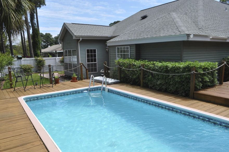 This is a beautiful home nestled in a quiet subdivision. Open floor plan with travertine tile throughout most of the house. Nicely remodeled kitchen with breakfast bar and granite countertops. French doors in living room opening to a wonderful fenced in backyard with deck and heated pool. Large master bathroom with double vanity sink and walk in shower. Walk in closet in master bedroom. Oversized two car garage. Close to shopping, restaurants, and the beach. Bay Bridge landing offers community bay front pool and pier access with low association fees. Room dimensions to be verified by buyer.