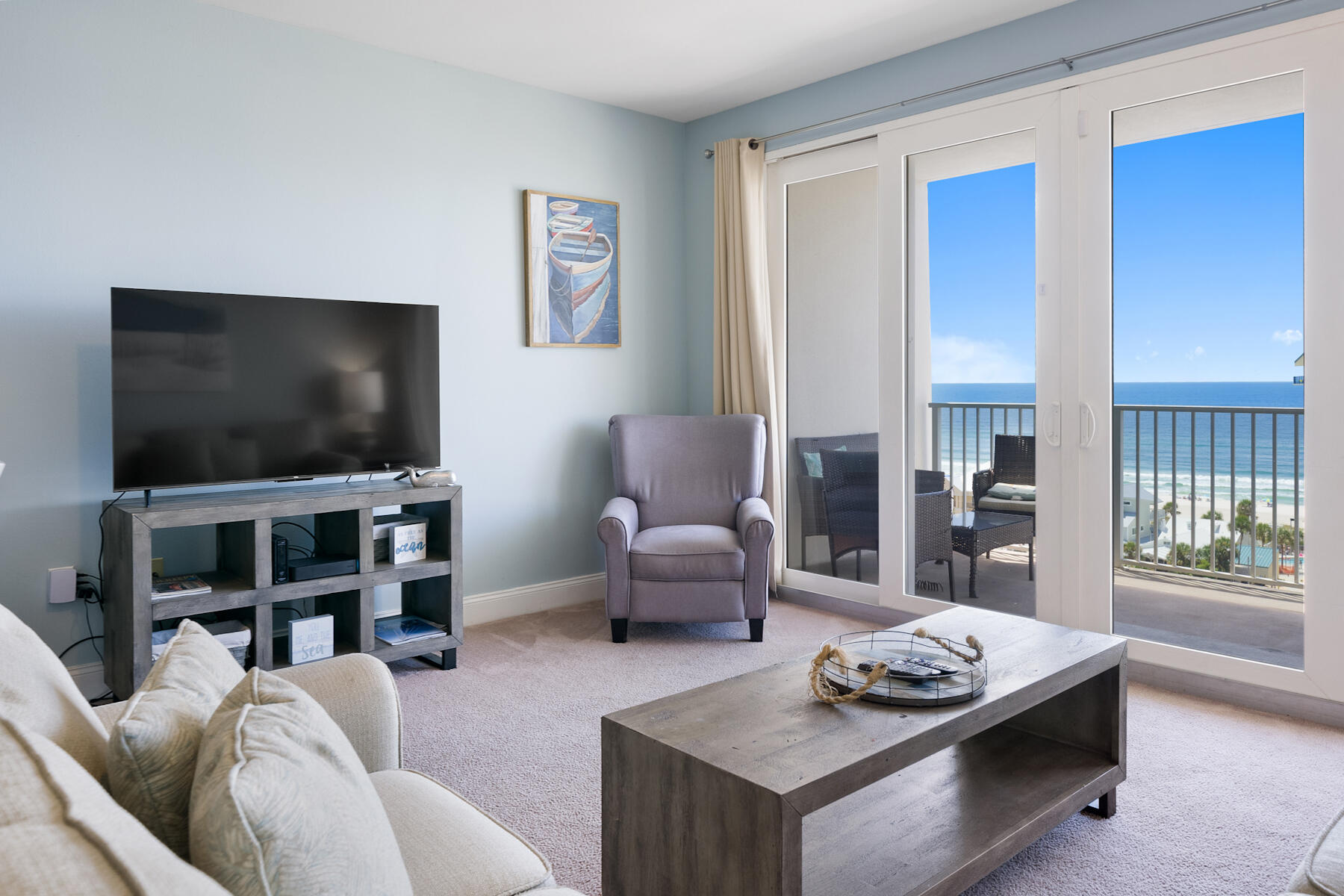 Beautiful turn key coveted gulfview unit sleeps 8 offers breathtaking views from the main living area, main bed and spacious balcony on this premium floor. The sleeper sofa provides even more space for your guests. The open floor plan is great for entertaining. This gorgeous unit comes fully furnished with coastal accents. New appliances 2020 with fridge being 2022, new carpet, ceiling fans, king bed AND barn door. The kitchen's solid surface countertops, massive island, and generous cabinetry is more than adequate for any chef. Come see all of the amenities that Laketown Wharf has to offer: 5 pools, a children's playground, splash bar and grill, professional fitness center with panoramic views of the gulf, putting green, covered parking, private lake, and convenient access to the beach.