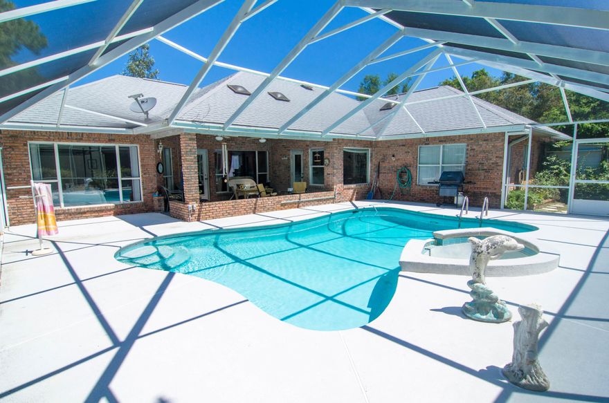 Country club living at the beach in Indian Bayou. Don't miss your chance to buy the LOWEST PRICED home in desirable Indian Bayouwell maintained home on a large lot offers 3 bedrooms, 2.5 baths home plus a sparkling screened pool and lovely covered porch area and views of the Indian Bayou golf course. This home is built to take advantage of the pool and rear yard with loads of natural light and pool views from almost every room! New roof in 2010 and all new floors including sleek tile and wood laminate. The large driveway and side load garage allows parking for multiple cars. All of this wrapped up in one of the area's most desirable neighborhoods, Indian Bayou, with ultra low HOA fees that include security! Just a quick jaunt to the beach via Henderson Beach - owners in the city o