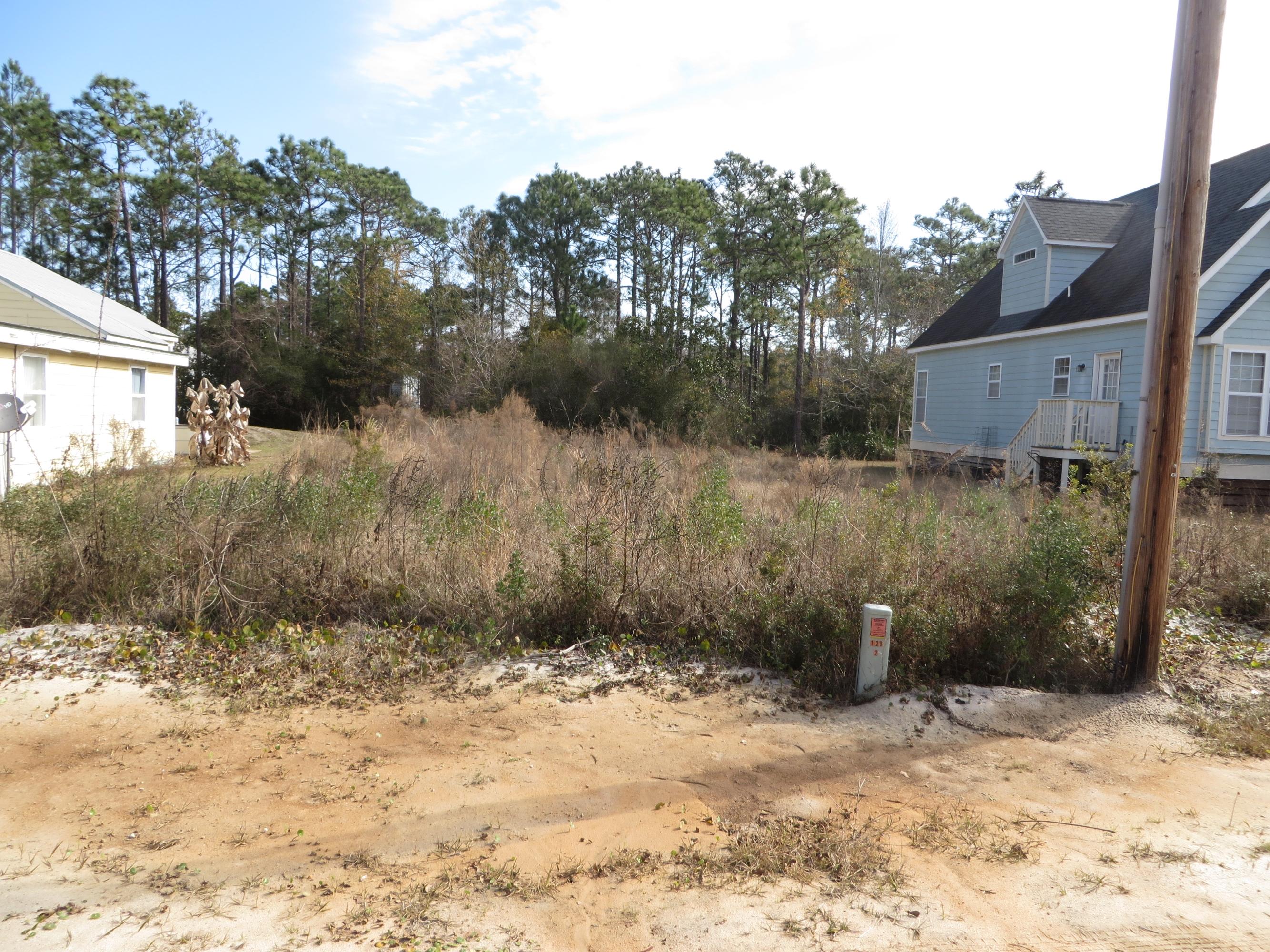 Vacant lot in Old Town area of Santa Rosa. Close to Hogtown Bayou, boat launch, and picnic area. This lot will accommodate mobile homes and single family residental houses. Public water and sewer are available and no HOA exists. There is no monthly fee and no build out time. This is a great lot to build your home on now or hold as investment for the future.