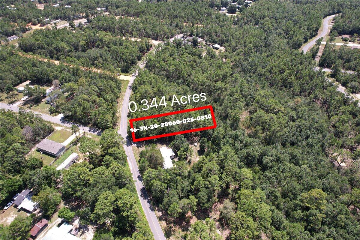 Step into your own enchanted forest with this prime wooded lot, ripe for the dream home you've always envisioned! Imagine waking up to the symphony of songbirds and the aroma of the wooded surrounding. This canvas of lush greenery offers endless possibilities, from a cozy woodland retreat to a modern architectural marvel. With ample space for clearing, you're not just buying land; you're investing in a lifestyle. Come, let your imagination run wild and build your sanctuary in nature's lap! Public water is available on Brookside Dr through Mossy Head Water Works, a tap fee would need to be paid. Electric runs all down Brookside Dr. Septic tank would be required.