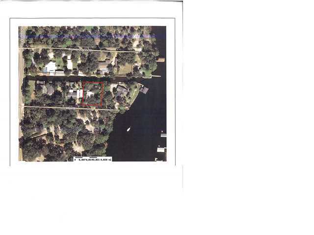 Canal WATERFRONT with 100 feet on the water. Possible lot split once existing mobile home is removed. Water tap fee paid. Canal leads to Mack Bayou & then out to Choctawhatchee Bay. This is the perfect location for the laid back lifestyle for fishing & boating.The canal is the widest at this point.Neighbors have nice size fishing boats, pontoon boats, & jet skies for recreaction and pleasure. Build your dream home(s) on this wooded lot with mature shade trees. Electric, water, phone & cable are available. No Association Fees and no build-out time. Conveniently located near Sacred Heart Hospital, Publix grocery, Grand Boulevard designer shops, restaurants, championship golf & the beautiful white sand beaches & emerald waters of the Gulf of Mexico. All information to be verified by