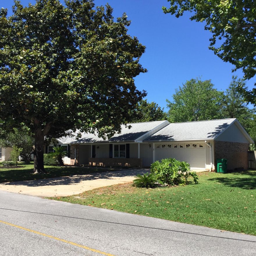 This is a great house on a great street near Destin Elementary School and convenient to all back-channel Destin transportation routes -- and the boat ramps on Joe's Bayou. Open greatroom floorplan from kitchen to dining area and to living room. New paint and new floors; 2013 appliances. 2008 roof. 2002 HVAC. Full-size 2-car garage with work area. Large backyard with a good sunny patch.
