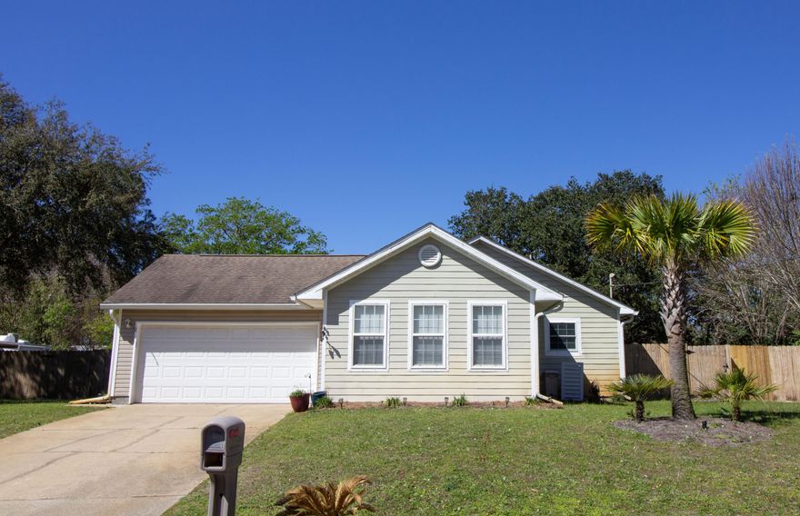SELLER WILL REPLACE ROOF AT CLOSING WITH ACCEPTABLE OFFER! VA Assumption* Available at 3.75%! This charming 3 bed/2 bath home located in East Navarre is now For Sale. Located just 8 min from Hurlburt Field. At 1196 sq ft, this home enters into the spacious Florida Room with vaulted ceilings and flows into the living room featuring wood burning fireplace.  The kitchen has been updated to include stainless appliances and granite countertops, and the formal dining room exits to the first exterior patio.  Master bedroom with ensuite features French doors exiting to secondary patio.  Large backyard is fully fenced with double gate on the south side.  HVAC 2020, Water Heater 2024. Tenant in place thru 05/26/25.  Seller will transfer Old Republic Home Warranty at closing, expires 04/11/26.