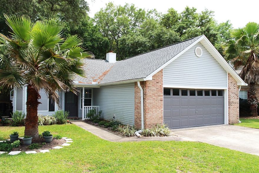 Fantastic home located on one of the largest most private lots in the Indigo Village area of Bluewater Bay. This MOVE-IN Ready 3 bedroom 2 bath house is conveniently located close to the Mid-Bay bridge shopping, restaurants and the Bluewater Bay Resort. Upgrades Galore!! This home has been newly painted, Roof and A/C are three years old, Laminate Flooring, Granite Counter Tops, Stainless Steel Appliances, Updated Bathroom Vanities and Light Fixtures and Ceiling Fans and New Carpet throughout. The home features vaulted ceilings,large bedrooms, nice living space, extra large family room, Florida Room and large back yard with mature trees and privacy fence. Fantastic home for the price!!