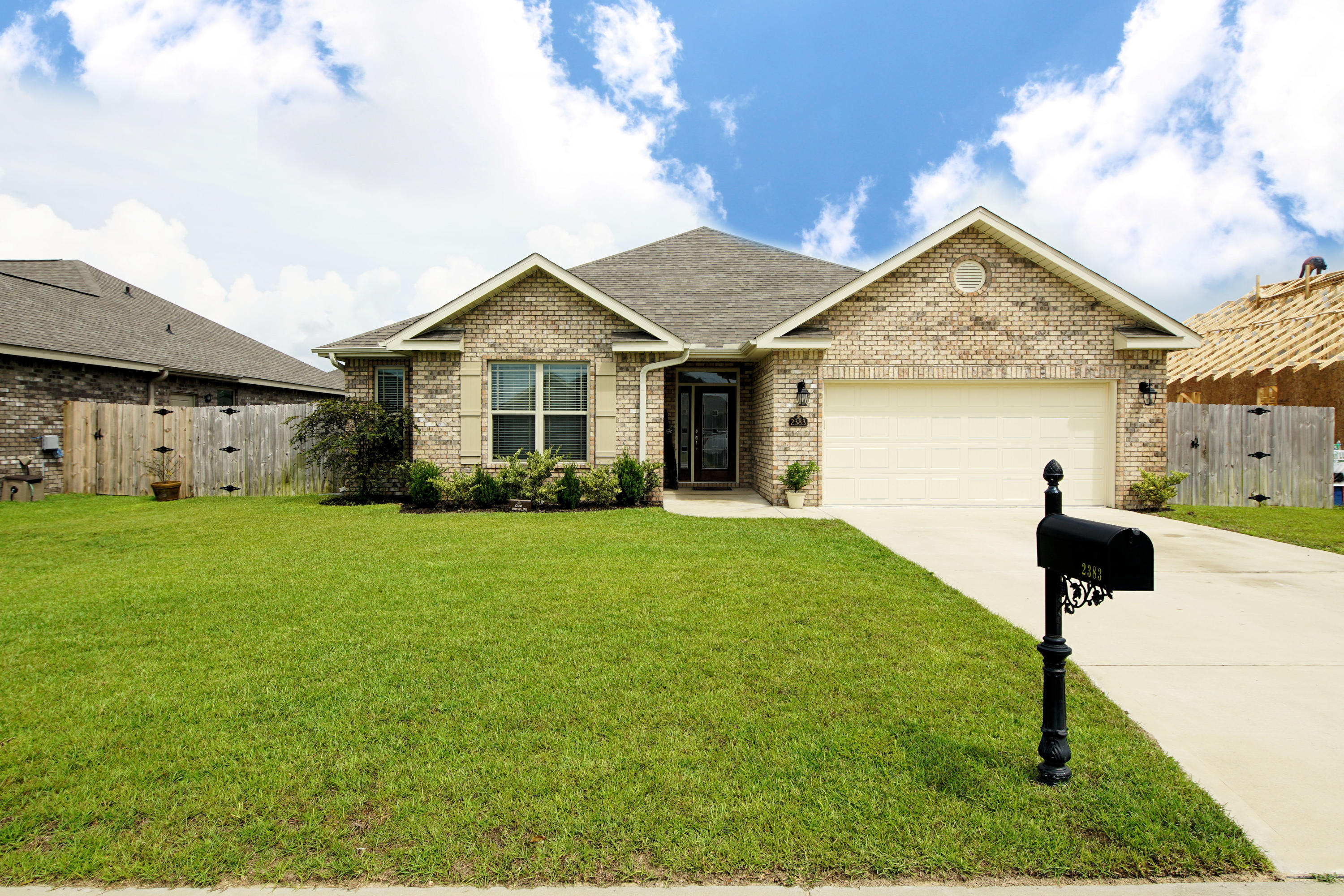 Gorgeous 3 bedroom and 2 bath brick home with 2029 sq ft located in the MAJESTIC OAKS AT OCEAN CITY Subdivision! This home was built by a highly reputable local builder who has won many Parade of Home awards! This home is located minutes from white sandy beaches, the air force bases, shopping, restaurants, and excellent schools! The neighborhood is also located adjacent to the County's new Stillwell Park with lots of open green space, a recreation path, picnic tables and a basketball court. Enter the home through an expansive foyer that leads into the open family/ kitchen and dining room area. Two bedrooms and bathroom are to the left of the foyer area. The kitchen boasts granite counter tops, stainless and black appliances to include a French Door Refrigerator and built-in microwave,