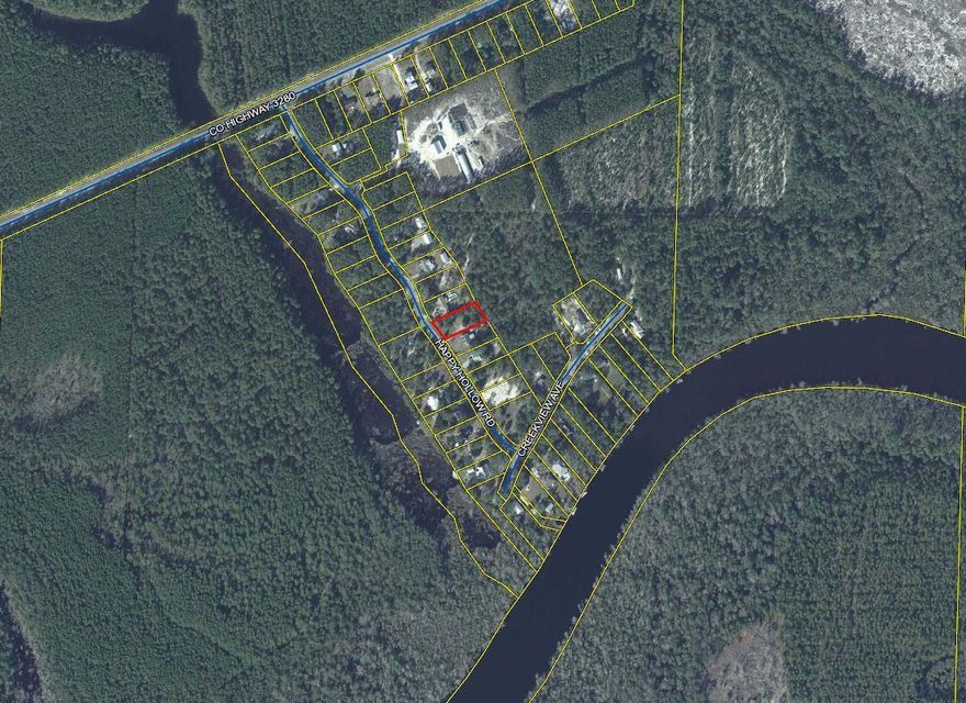 Over 1/2 acre homesite with community boat launch/access to Black Creek. Only minutes to Beaches of South Walton, Choctawhatchee Bay and Freeport.