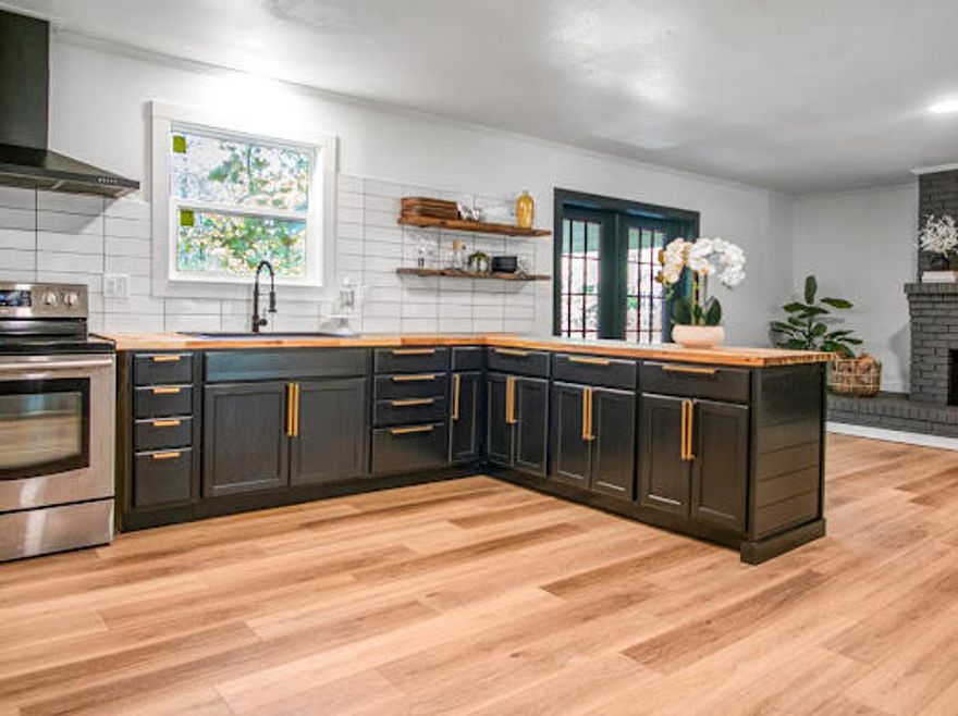 Open House: 10 - 11 Nov from 10am - 3pm. Your next investment or next home. Home is vacant. This house is basically new. New waterproof LVP floors, stainless steel appliances, counter tops, bathrooms, custom master walk in standing shower, remodeled kitchen, paint, trim, molding, hot water heater, wood burning fireplace, Bluetooth garage doors, and keyless entry. Beautiful French doors that open spacious back yard with endless possibilities and no HOA. Completely wooded on the sides and behind the property for privacy. Black accent throughout the home. Home boasts a metal roof, 2 car garage, and HVAC system from 2012 and recently serviced. Seller will provide 5k toward closing cost with acceptable offer. *****Open Showings November 10 -11 from 10am - 3pm. Come check us out.*******