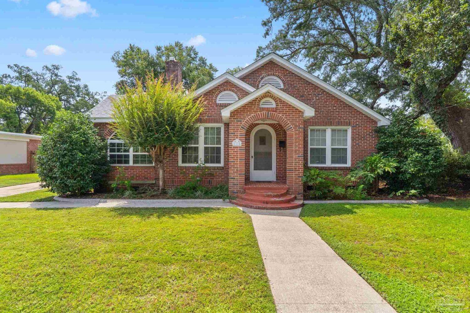 Beautifully crafted 1946 brick cottage with a pool in the heart of East Hill. The main floor hosts 2 bedrooms and 2 full bathrooms including the primary suite with additional cozy sitting room and direct pool access. This gem offers over 1,900 sq. ft. of living space, including a finished attic with two bonus rooms--ideal for a home office, playroom, or additional bedrooms. Recent updates include a new roof with hurricane clips (2023), upgraded electrical system, a new pool liner (2022), Polaris pump and direct line waste water management. The home's original flooring in the living room area adds vintage charm, while past renovations (down to the studs) included new in wall insulation, windows, and sheetrock. Set on a spacious .29-acre lot, the backyard is perfect for outdoor living with a pergola, pool, and detached garage with ample parking. Just minutes from Downtown Pensacola, Pensacola Beach, and NAS, this home is perfectly located and ready for your personal updates.