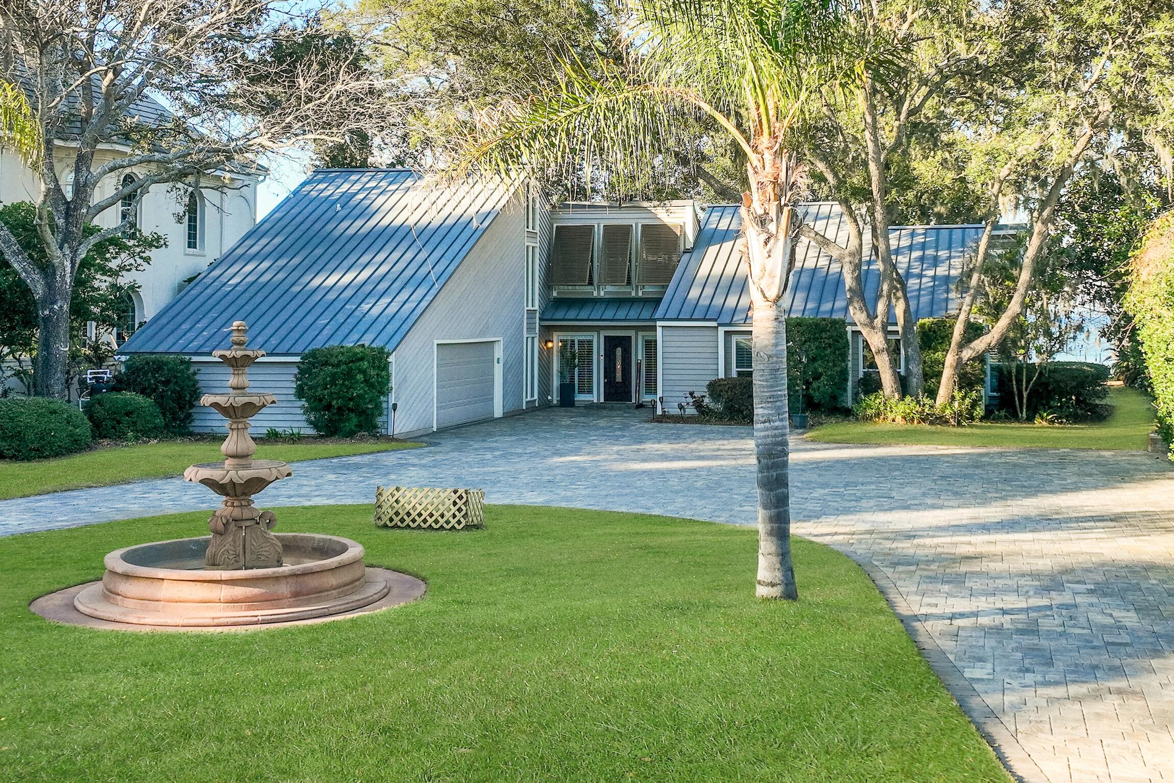 Come see one of the finest bayfront lots in Destin! House features 100 feet of bay frontage on just under an acre lot. You will want to see the adjacent 800+ sq ft Florida Room which brings the outdoors in and is climate controlled by a mini-split system.The living room features a fireplace and vaulted, beamed shiplap ceiling and wet bar and wine refrigerator. Large dining room for gathering of family and friends. Kitchen features a breakfast area and laundry room.The first floor primary suite features a remodeled bathroom complete with stand up Onyx shower. Two additional bedrooms are on the first floor.Second floor primary suite features two closets, built-in customer dresser and deck with bay views. Second floor also features custom cedar closet and additional bedroom.