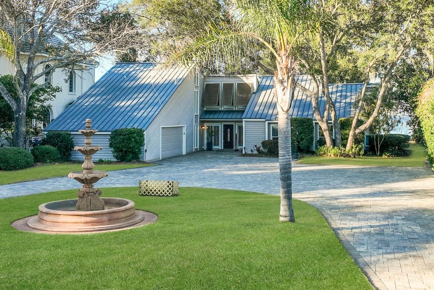 Come see one of the finest bayfront lots in Destin! House features 100 feet of bay frontage on just under an acre lot. You will want to see the adjacent 800+ sq ft Florida Room which brings the outdoors in and is climate controlled by a mini-split system.The living room features a fireplace and vaulted, beamed shiplap ceiling and wet bar and wine refrigerator.  Large dining room for gathering of family and friends.  Kitchen features a breakfast area and laundry room.The first floor primary suite features a remodeled bathroom complete with stand up Onyx shower. Two additional bedrooms are on the first floor.Second floor primary suite features two closets, built-in customer dresser and deck with bay views. Second floor also features custom cedar closet and additional bedroom.