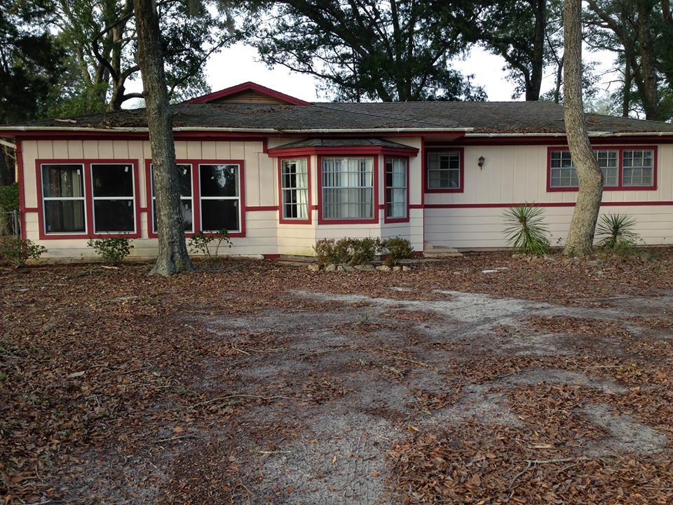 Deal of a lifetime! This home has a wonderful view of the Choctawhatchee Bay on two sides. The property sits high up on the opposite side of the highway and bay. This is a solidly built home that has been added on throughout the years. The home features hardwood floors, beamed ceilings, tongue and groove wall paneling in the dining and living area. There is a hurricane room at the back of the home. The home is only a few short miles to: Freeport, Destin, Eglin Air Force Base and the airport.The home sits on a corner lot and has an extremely large yard. Mature trees oaks, magnolias dot the property.All measurements are estimated and need to be verified by the buyer and the agent for their own use. Square footage from Tax Roll.