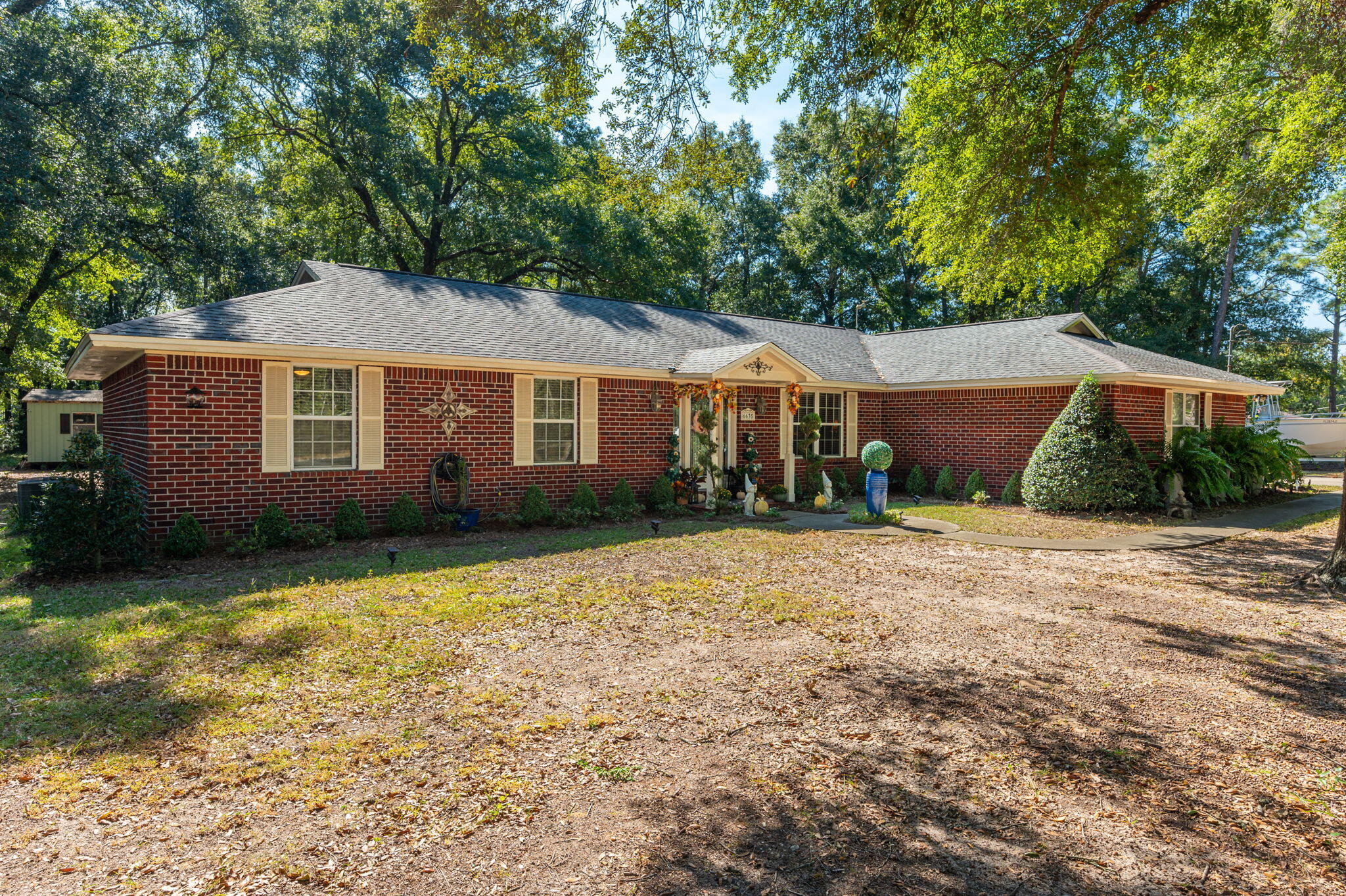 Custom home with NO HOA and 1 acre just minutes from i10 that's USDA Financing eligible. This beautifully maintained 4-bedroom, 3-bath home offers the perfect blend of comfort, convenience and functionality you can't beat. This home boasts a split bedroom floor plan with not one but TWO master suites, LVP flooring throughout, separate dining and breakfast areas, granite counter tops, covered porch, outdoor shed with covered parking area, his and hers closest and so much more.In addition to its charm, this home is equipped with modern amenities, including solid core doors, a newer roof and a HVAC system that is less than 2 years old. The garage has been converted into a versatile flex space, providing an additional living area or home gym so let your imagination run wild.