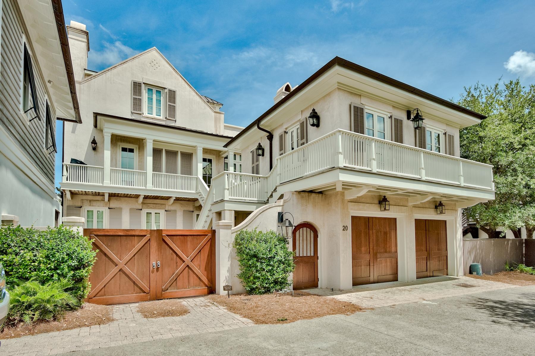 Enjoy gulf views from this magnificent coastal Rosemary Beach estate home. Situated on boardwalk H, this wonderful location is just steps from both the beach and the cafes of Rosemary Beach. Built to a high standard, this custom all masonry block home with cooper roofing abounds with architectural detail ranging from pecky cypress ceiling inlays to brick and coastal wood flooring.This larger Rosemary lot offers a dramatic pool with fountain backdrop and outdoor fireplace. There is ample parking for up to four vehicles.A magnificent staircase leads you through this comfortable easy living floor plan. The main house features three floors with a finished basement. It connects to the carriage house via a 2nd floor bridge walkway.