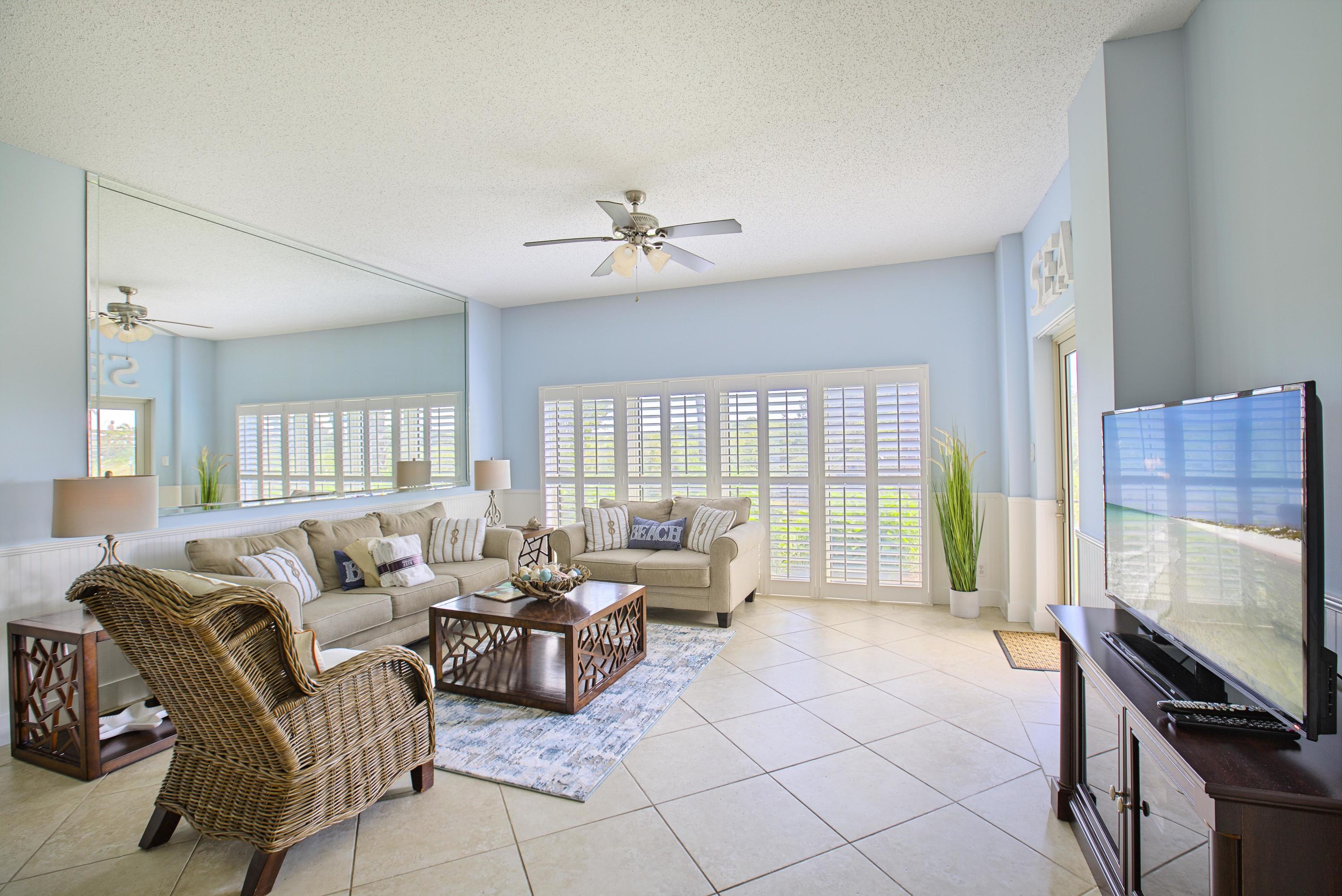 Freshly painted and gorgeous! This is your time! Don't miss this superb two bedroom, two bathroom beachfront condo located in the coveted Tops'l beach resort. Only a frisbee throw to your deeded beach access, enjoy a grassy yard to lounge or play catch with your crew! This, ready to rent vacation rental, is updated throughout offering new granite, backsplash, and living room furniture. Tops'l Beach Manor offers covered parking & is gated. Tops'l is an immaculate 52 acre resort with 600 feet of beach front, Fitness center, seasonal TRAM service, lighted Rubico Tennis Courts, Racquetball and more.