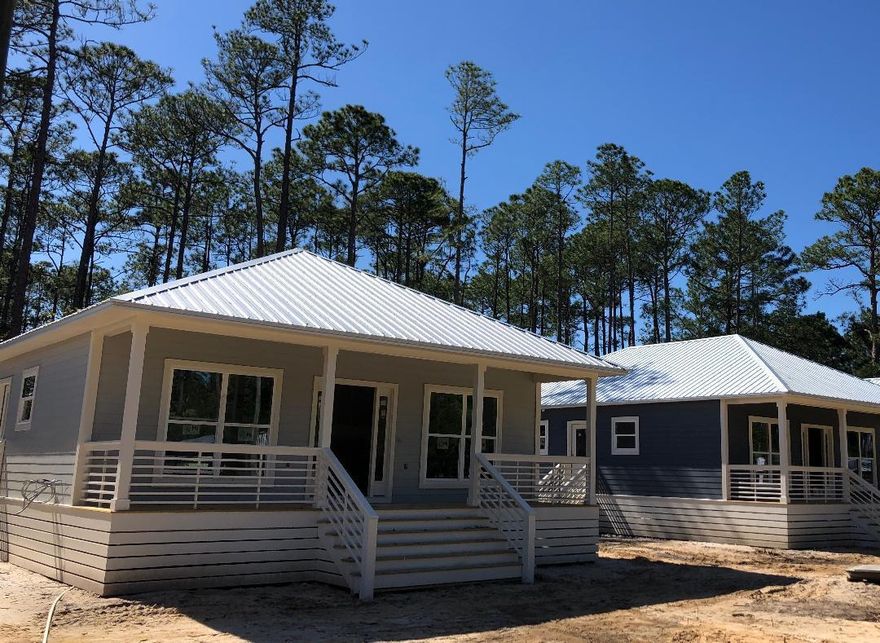 Beautiful new construction! Walk up to your spacious front veranda style porch. Open-concept kitchen and living room which boasts 9 ft ceilings though out the home. Granite counter tops and island. LVP flooring throughout the home. 3Bd/2Ba, bathrooms featuring custom tile-work and granite countertops. Spacious master suite with walk-in closet. Separate laundry room. Fantastic Location- short drive to Ed Walline Public Beach Access, 5 minute drive to Cessna Landing Park and boat launch, short drive to Gulf Place, shopping, and local favorite restaurants.