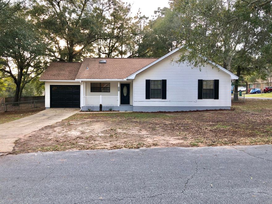 Are you looking for your first home? This 3 bedroom 2 bath is just the one you are looking for. As you walk inside you are greeted with a beautiful living room with a brick wood burning fireplace and vaulted ceilings. This home has been updated with new paint, flooring in bedrooms and updates in kitchen with tile backsplash and new countertops, new stove, new dishwasher. Enjoy the large backyard yard with new deck located on a corner lot to park your boat or build a shed. This home is centrally located near schools, shopping and 30 minutes away from bases and beaches. Make this beautiful cozy home yours today. Buyer to verify all measurements and all areas of importance.