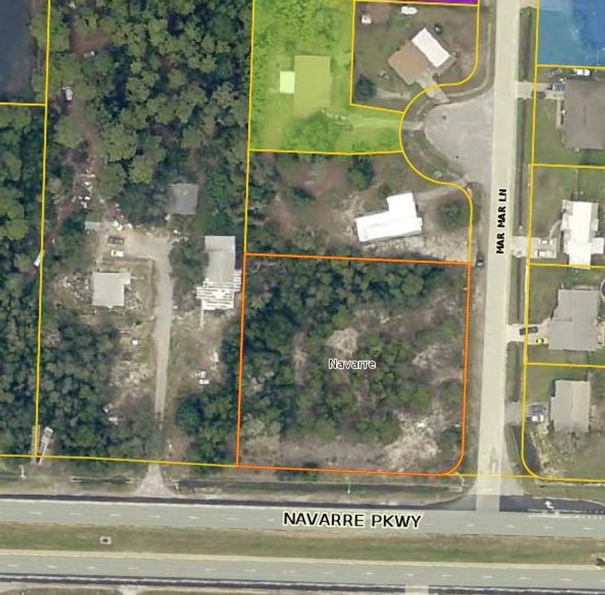 1.105 acre corner commercial lot on the east side of Navarre, bank owned, great visibility and high traffic count just east of the Navarre bridge, great location for many uses