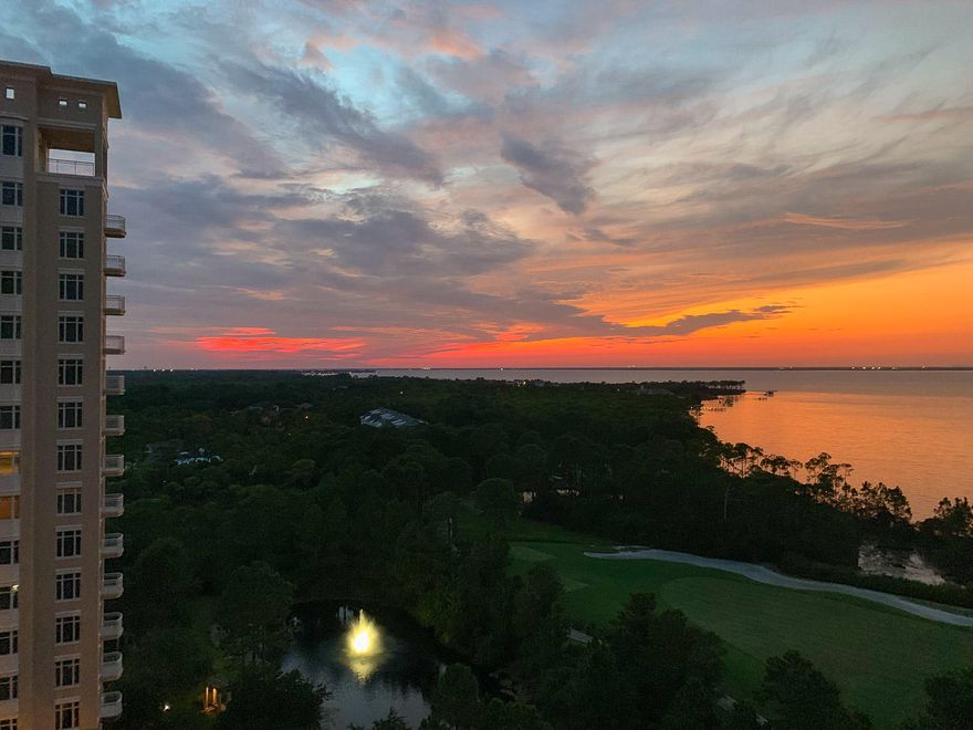 Highly coveted ''Edgewood'' floor plan with many upgrades and fine finishes.The residence offers panoramic views to the West, with both Gulf and Bay vistas, boasting near year round sunsets.Two separate HVAC units allowing the home owner true climate control in the master quarters and the remaining living areas. A ''two way'' fireplace divides the dining and living area. This residence has been remodeled, with many custom features (please see the attached remodel/upgrades attachment). Cherry woods floors throughout, custom cabinetry, custom double French entry doors, living room dividing wall removal and two brand new HVAC units, are just some of the many attributes of this wonderful property. All of the sellers disclosure and condo/hoa documents have been uploaded as well.