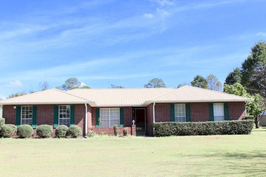 Well maintained 4 bedroom 2 bath custom home located in upscale Pine Shores S/D. New metal roof installed in 2015. New HVAC system installed recently. Attached 2 car garage.Garden area in the back. Florida room with large windows that can act as a screened porch or sunroom. Easy access to all amenities. Minutes to historic downtown Defuniak Springs voted best small town in the State of Florida in 2019. shown by appointment only.  24 hours notice please