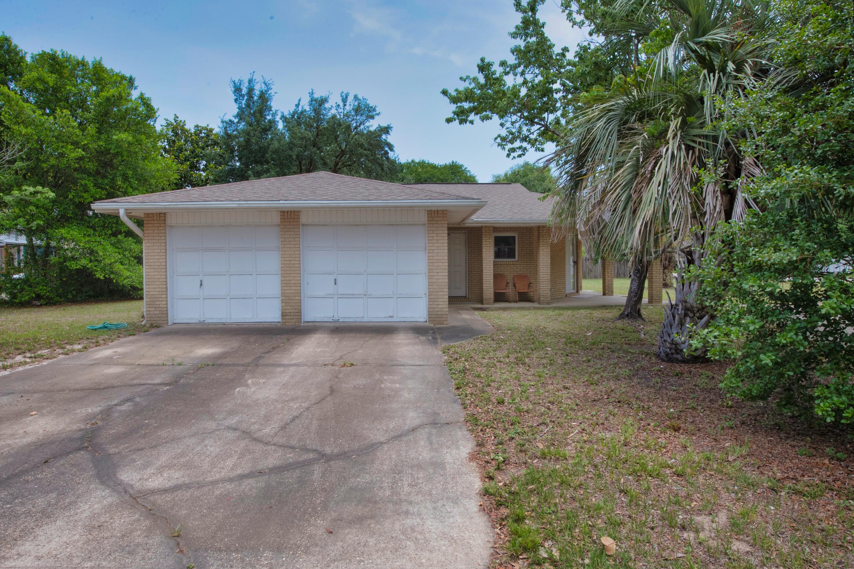 Welcome home to this cute little bungalow steps away from the sound. This all brick home, is a one of a kind located in the heart of Navarre, featuring 2 bedrooms 2 bathrooms, all in original built, immaculate condition. This corner lot gem includes two driveways, enough for multiple cars! A whole home generator included as well as updated appliances, windows, AC unit, Hot Water heater, and a new roof will be installed with an acceptable offer. Walking distance to a kayak launch! Call your favorite agent today and come view this wonderful property!