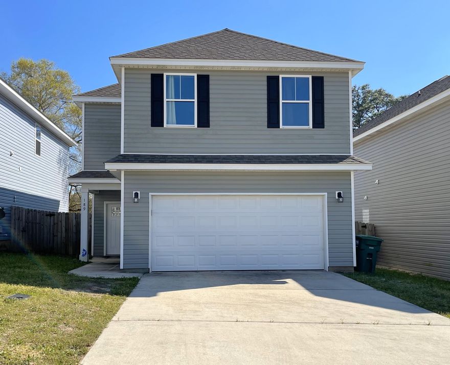 Open floor plan with dining, kitchen and living room all in one, Laminate flooring on first floor. Kitchen has granite countertops all stainless appliances. Nice large foyer and 1/2 bath down stairs. Upstairs are four bedrooms that are carpeted all wet areas upstairs are tile with laundry room upstairs. Home has two car garage with can lighting ,HOA takes care of the yard . Middle of town mins away from bases easy access to interstate.