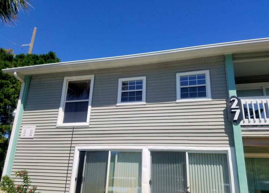 Oversized living/dining room. The balcony is enclosed-incorporated into the living area of the condo. Quiet location. This condo is the farthest from Hwy 98. Located in the NW corner of the complex. Freshly painted. Good storage & parking. Fishing pond, 3 pools, 2 tennis courts, clubhouse, boat, R/V parking. Full time living & excellent for rental. Won't last.