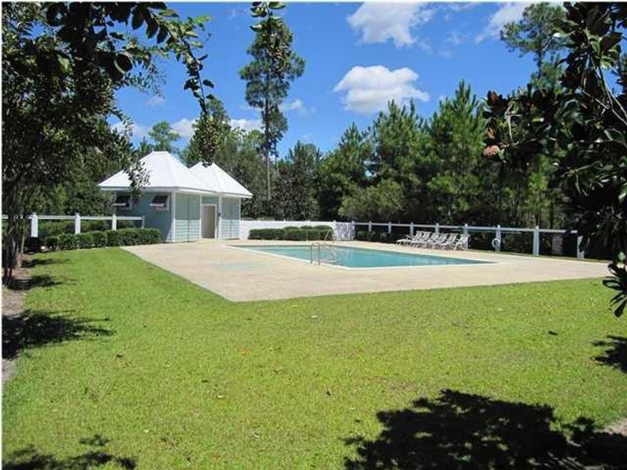 LARGE LEVEL BUILDABLE LOT IN NIEGHBORHOOD WITH PAVED ROADS, STREET LIGHTS, AND COMMUNITY POOL. THERE ARE SEVERAL NICE HOMES ALREADY CONSTRUCTED IN THE SUBDIVISION. PUBLIC SEWER AND WATER IS AVAILABLE ALONG WITH CLOSE PROXIMITY TO THE BAY MAKE THIS A WISE CHOICE FOR YOUR NEW HOME AT A FANTASTIC PRICE.