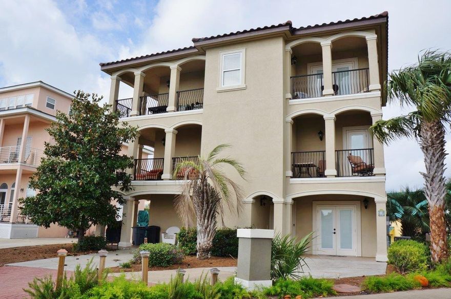 Priced to sell!! This home is located in the Heart of Blue Mountain Beach with Stunning 2nd and 3rd floor Gulf views. This large 5 bedroom 4.5 income producing home is what you have been looking for. As you enter the home the first floor was created as a mother in-law suite with two bedrooms, laundry, and kitchenette. Upstairs in the main living area you a greeted with a large open kitchen, living, and dining room that is accent with hardwood floors throughout. As you step out onto the wrap around balcony there are incredible eastern views to the gulf as far as the eye can see. As you continue up to the 3rd floor there are two additional bedrooms one being the private master suite. The Master suite boast the most stunning views from the house with the large private balcony.